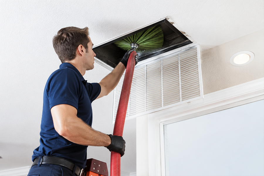 Air duct cleaning technician